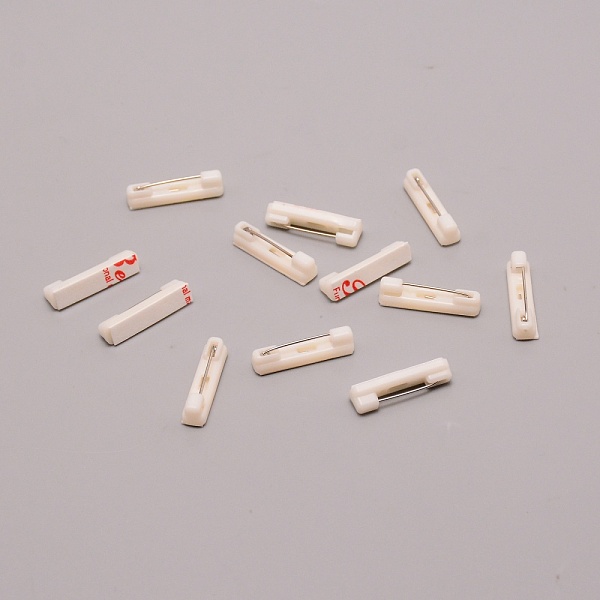 

PandaHall Adhesived Plastic Back Bar Pins Brooch Findings, with Iron Pins, Rectangle, Old Lace, 22x5x4.5mm, Pin: 0.6mm Plastic