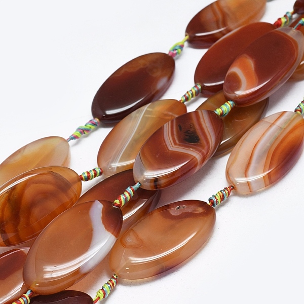 

PandaHall Natural Banded Agate/Striped Agate Beads Strands, Dyed & Heated, Oval, Saddle Brown, 48~51x20~26x8~10mm, Hole: 1.8mm, about...