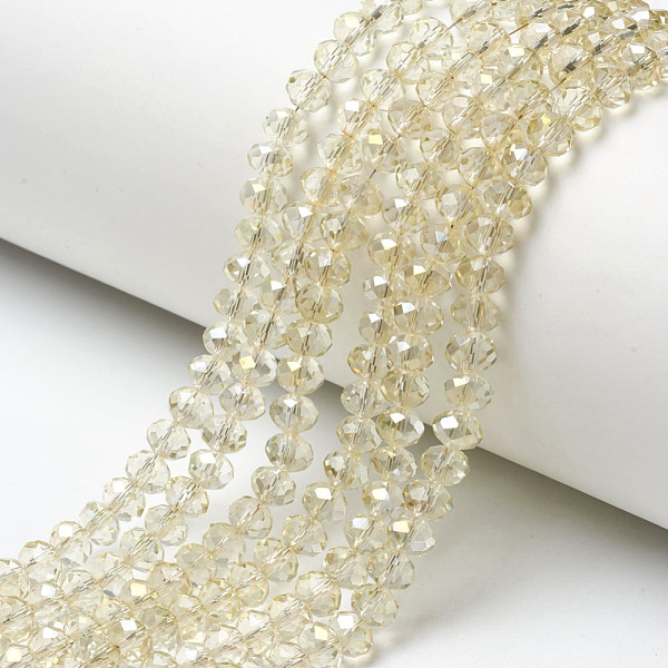 

PandaHall Electroplate Transparent Glass Beads Strands, Half Rainbow Plated, Faceted, Rondelle, Light Yellow, 6x5mm, Hole: 1mm, about...