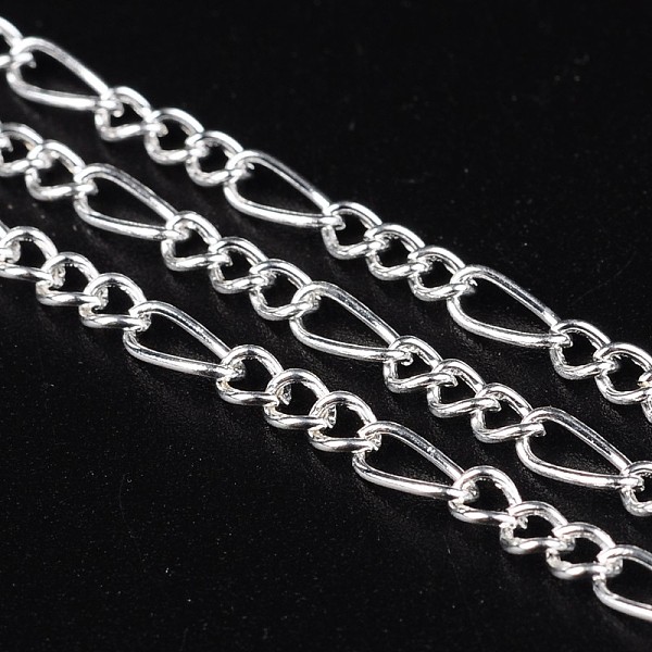 

PandaHall Iron Handmade Chains Figaro Chains Mother-Son Chains, Unwelded, Silver Color Plated, with Spool, Mother Link: 3x7mm, 1mm thick...