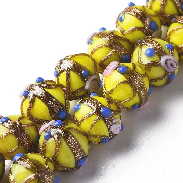 

PandaHall Handmade Gold Sand Lampwork Beads Strands, Round with Flower, Yellow, 13~15x11~13mm, Hole: 1.6mm, about 45pcs/strand, 20.47...