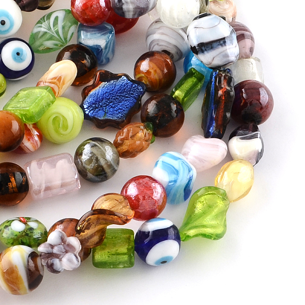 

PandaHall Mixed Shapes Handmade Lampwork Bead Strands, Mixed Color, 12~24x10~20x6~14mm, Hole: 1~2mm, about 30pcs/strand, 11~18 inch Lampwork..., Multicolor