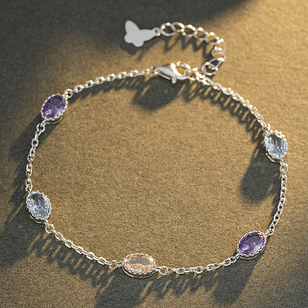 Bracelet en argent sterling serti de zirconiums cubiques ovales colorés