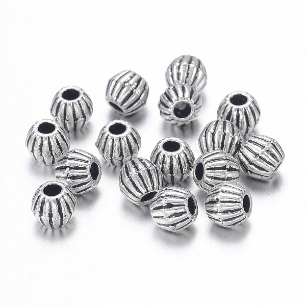 

PandaHall Tibetan Style Alloy Spacer Beads, Lead Free & Cadmium Free, Bicone, Antique Silver Color, 4x4.5mm, Hole: 1mm Alloy Bicone
