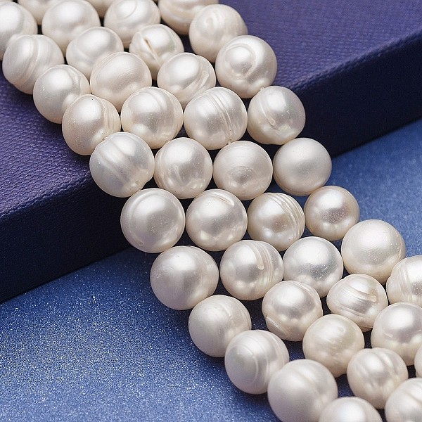 

PandaHall Natural Cultured Freshwater Pearl Beads Strands, Potato, White, 9~11x9~10mm, Hole: 0.5mm, about 39pcs/strand, 14.76 inch(37.5cm)...