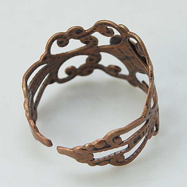 

PandaHall Brass Filigree Ring Shanks, Adjustable Ring Base Findings, Lead Free, Red Copper Color, Size: Ring: about 17mm inner diameter...