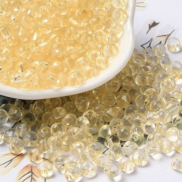 

PandaHall Transparent Acrylic Beads, Round, Beige, 5.5x5x4mm, Hole: 1.2mm, about 8333pcs/set Acrylic Round Yellow