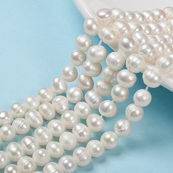 

PandaHall Natural Cultured Freshwater Pearl Beads Strands, Potato, Seashell Color, 6~7x7~8.5mm, Hole: 0.5mm, about 26pcs/strand, 7.09 inch...