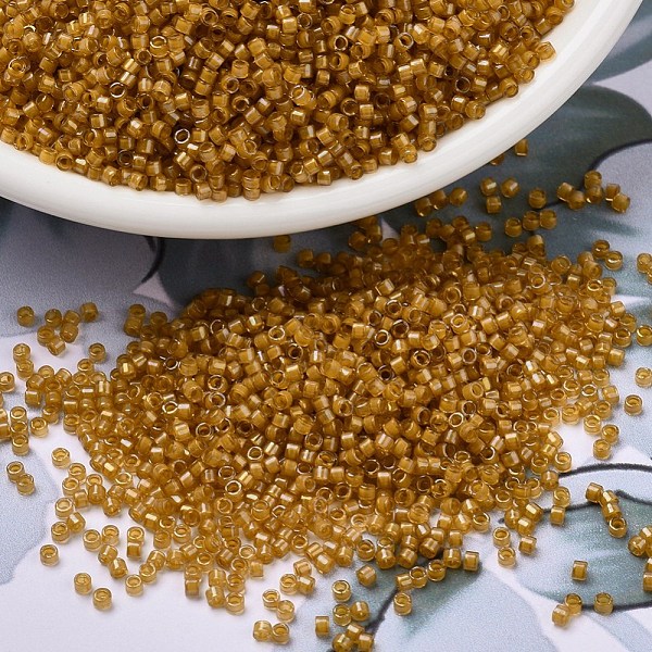 

PandaHall MIYUKI Delica Beads, Cylinder, Japanese Seed Beads, 11/0, (DB0272) Goldenrod Lined Topaz AB, 1.3x1.6mm, Hole: 0.8mm, about..., Brown