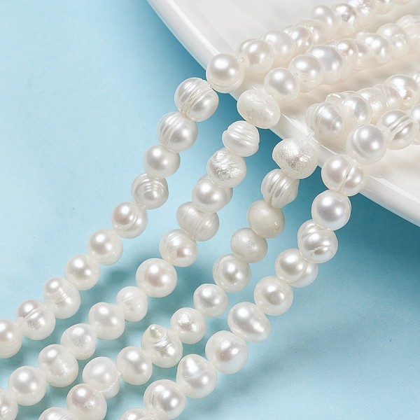 

PandaHall Natural Cultured Freshwater Pearl Beads Strands, Potato, Old Lace, 6.5~7mm, Hole: 0.8mm, about 57~58pcs/strand, about...