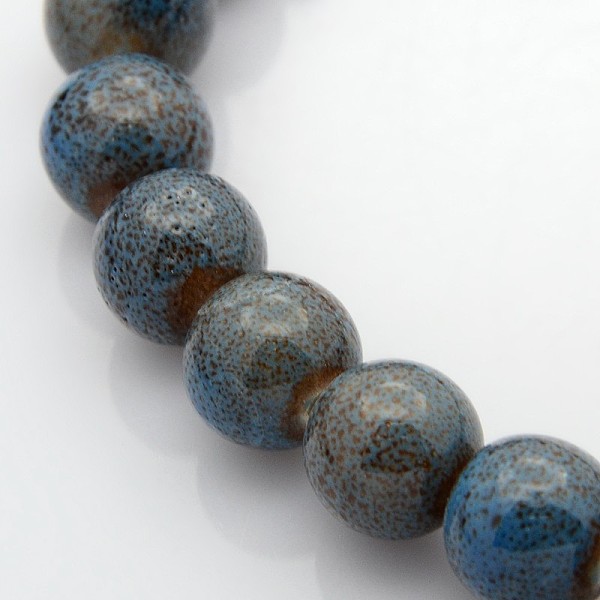

PandaHall Handmade Fancy Antique Glazed Porcelain Ceramic Round Beads Strands, Dodger Blue, 12~13mm, Hole: 2mm, about 30pcs/strand, 15.74...