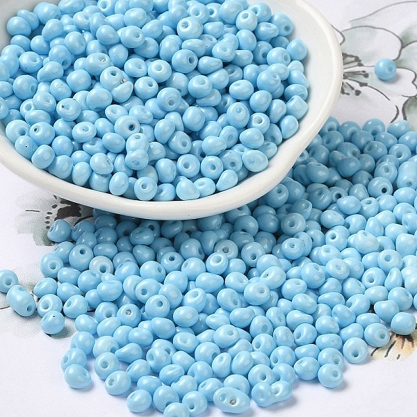 

PandaHall 6/0 Opaque Baking Paint Glass Seed Beads, Teardrop, Sky Blue, 4.5~5x4x3~3.5mm, Hole: 0.9mm, about 5625Pcs/Pound Glass Teardrop