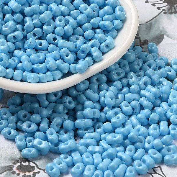 

PandaHall Baking Paint Glass Seed Beads, Peanut, Light Sky Blue, 5.5~6x3~3.5x3mm, Hole: 1~1.2mm, about 4000pcs/pound Glass Peanut