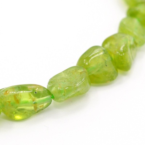 

PandaHall Natural Peridot Bead Strands, Tumbled Stone, Nuggets, 5~19x4~9x3~9mm, Hole: 0.5~1mm, about 15.7 inch Peridot Nuggets Green