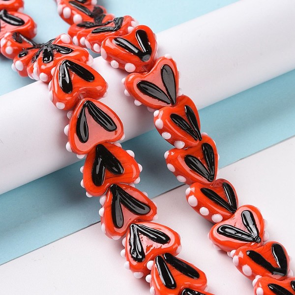 

PandaHall Heart Handmade Lampwork Beads Strands, Orange Red, 14~14.5x16.5~17x6.5~7mm, Hole: 1.5mm, about 30pcs/strand, 14.96~15.16 inch...