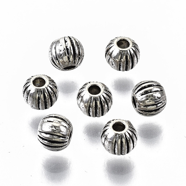 

PandaHall Tibetan Style Alloy Beads, Round, Cadmium Free & Lead Free, Antique Silver, 4x3mm, Hole: 1.2mm, about 6200pcs/1000g Alloy Round
