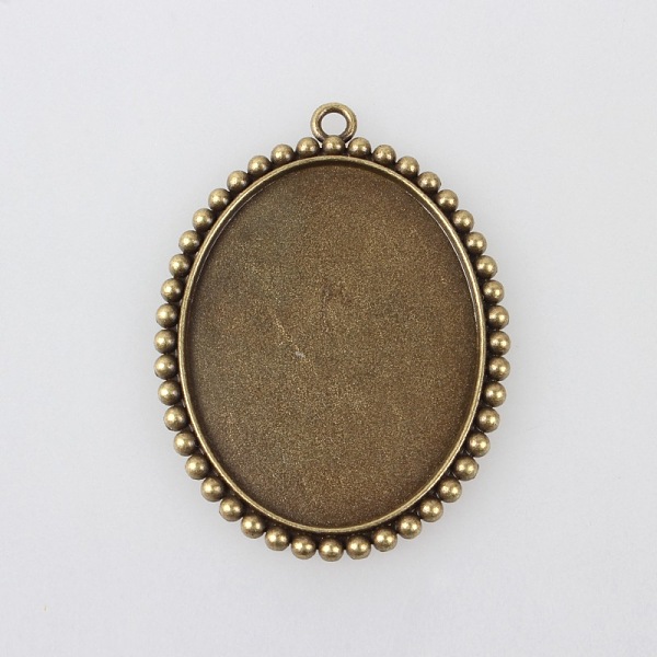 

PandaHall Vintage Tibetan Style Alloy Pendant Cabochon Bezel Settings, Cadmium Free & Nickel Free & Lead Free, Antique Bronze, Oval Tray...