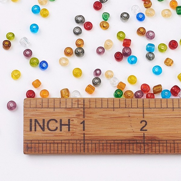

PandaHall 6/0 Glass Seed Beads, Transparent, Round, Mixed Color, 3.5~4x2~5mm, Hole: 1.2~1.5mm, about 4500pcs/pound Glass Multicolor