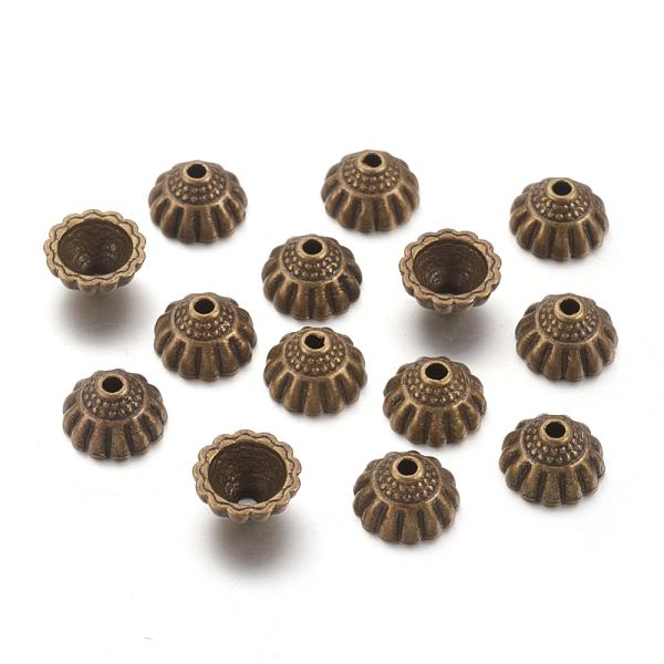 

PandaHall Tibetan Style Alloy Bead Caps, Lead Free, Cadmium Free and Nickel Free, Antique Bronze Color, about 10mm in diameter, 5.5mm thick...