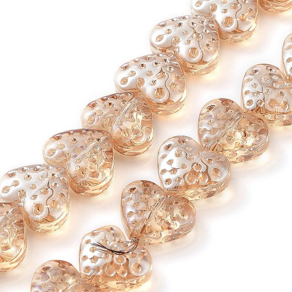 

PandaHall Electroplate Transparent Glass Beads Strands, Heart, Sandy Brown, 13x15mm, Hole: 1.2mm, about 50pcs/strand, 25.59''(65cm) Glass...