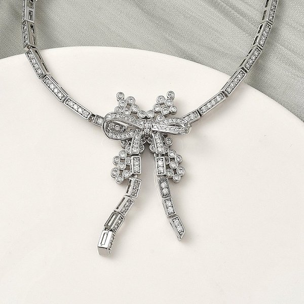 リボン結びの真鍮マイクロパヴェキュービックジルコニアリンクチェーンブレスレット（女性用）