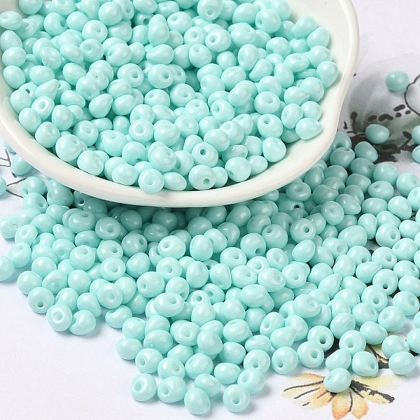 

PandaHall 6/0 Opaque Baking Paint Glass Seed Beads, Teardrop, Light Cyan, 4.5~5x4x3~3.5mm, Hole: 0.9mm, about 5625Pcs/Pound Glass Teardrop