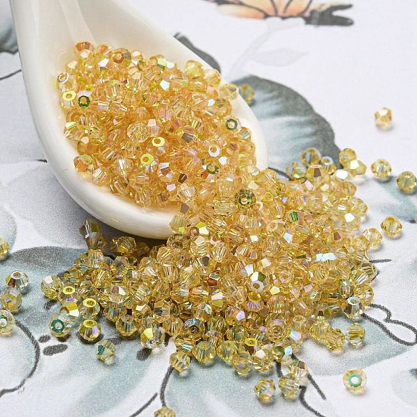 

PandaHall Transparent Electroplate Glass Beads, Rainbow Plated, Faceted, Bicone, Gold, 2x2mm, Hole: 0.7mm, about 720pcs/bag Glass Bicone...