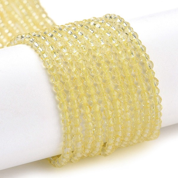 

PandaHall Transparent Glass Beads Strands, Faceted Round, Light Goldenrod Yellow, 2x2mm, Hole: 0.6mm, about 184pcs/strand, 14.49''(36.8cm)...