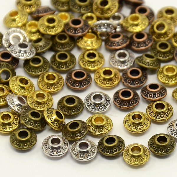 

PandaHall Mixed Antique Tibetan Style Alloy Bicone Spacer Beads, Lead Free & Nickel Free, Mixed Color, 6.5x4mm, Hole: 2mm, about 620pcs/200g...