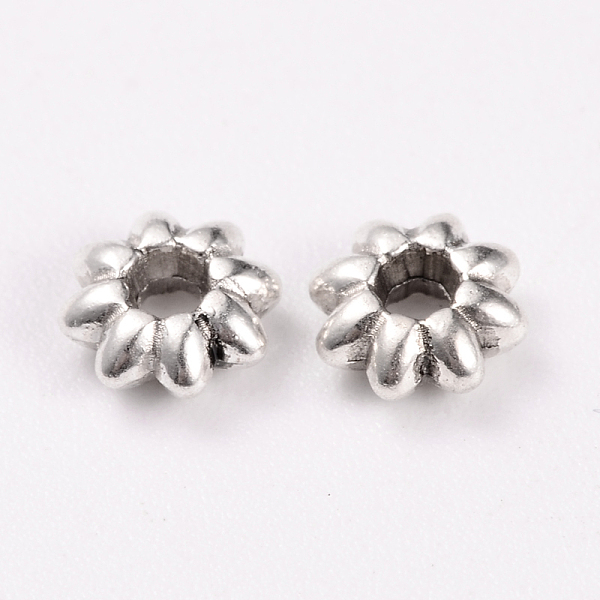 

PandaHall Tibetan Style Alloy Flower Spacer Beads, Cadmium Free & Lead Free, Platinum, 5.5x2mm, Hole: 1.8mm, about 6300pcs/1000g Alloy...