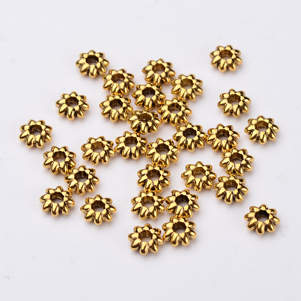

PandaHall Tibetan Style Alloy Flower Spacer Beads, Cadmium Free & Lead Free, Antique Golden, 5.5x2mm, Hole: 1.8mm, about 6300pcs/1000g Alloy...