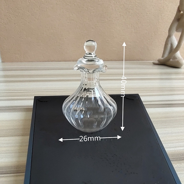 

PandaHall Miniature Glass Bottle, with Lid, for Dollhouse Accessories Pretending Prop Decorations, Clear, 26x40mm Glass Bottle Clear