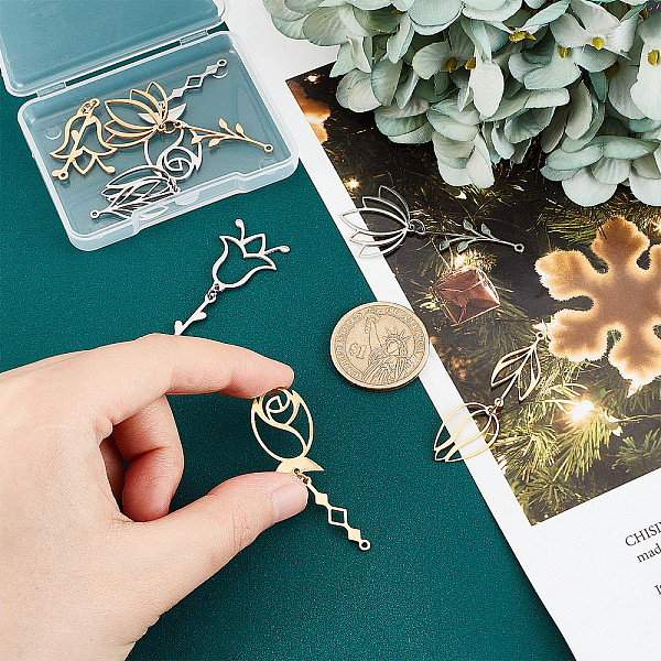 

PandaHall UNICRAFTALE 8pcs 2 Colors Flower Pendants 4 Styles Stainless Steel Pendants Laser Cut Lotus Rose Charms with Jump Rings for...