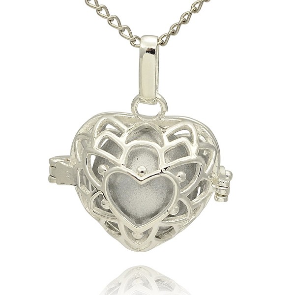 

PandaHall Silver Color Plated Brass Hollow Heart Cage Pendants, with No Hole Spray Painted Brass Round Beads, Silver, 24x26x18mm, Hole...