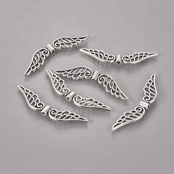 

PandaHall Tibetan Style Alloy Beads, Wing, Cadmium Free & Lead Free, Antique Silver, 12x52x4mm, Hole: 1.5mm, about 361pcs/1000g Alloy Wing