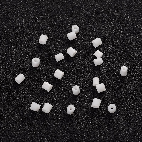 

PandaHall Two Cut Glass Seed Beads, Hexagon, White, about 3mm long, 1.8mm in diameter, hole: 0.6mm, about 21000pcs/bag. Sold per package of...