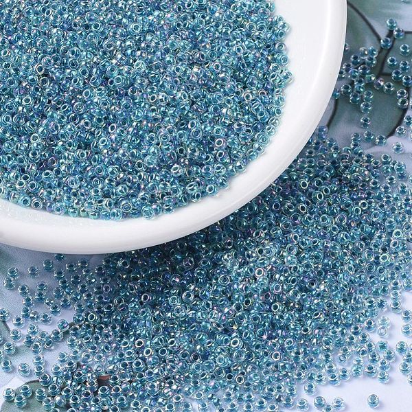 

PandaHall MIYUKI Round Rocailles Beads, Japanese Seed Beads, (RR279) Marine Blue Lined Crystal AB, 11/0, 2x1.3mm, Hole: 0.8mm, about..., Cyan