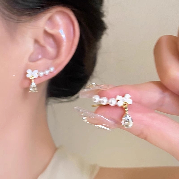 

PandaHall Bowknot with Teardrop Alloy Rhinestone Stud Earrings, Plastic Pearl Beads Earrings with 925 Sterling Silver Pins, Golden, 50x50mm...