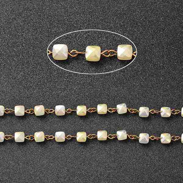 

PandaHall Handmade Chains, with Golden Brass Eye Pin and AB Color Plated Transparent Glass Beads and Spool, Cube, Unwelded, Light Goldenrod...