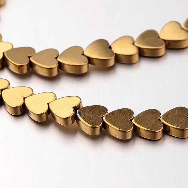 

PandaHall Electroplate Non-magnetic Synthetic Hematite Bead Strands, Heart, Golden Plated, 6x6x2mm, Hole: 1mm, about 71pcs/strand, 15.7 inch...