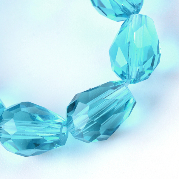 

PandaHall Transparent Glass Bead Strands, Faceted Teardrop, Deep Sky Blue, 8x6mm, Hole: 1mm, about 65pcs/strand, 17.99 inch(45.7cm) Glass...