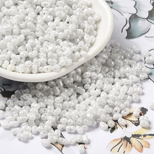 

PandaHall Glass Seed Beads, Peanut, White, 3.5~4x2~2.5x2~2.3mm, Hole: 0.8mm, about 8000pcs/pound Glass Peanut White