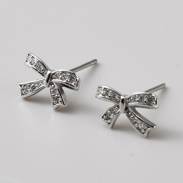 Aretes con circonita cúbica transparente y micropavé de latón con lazo