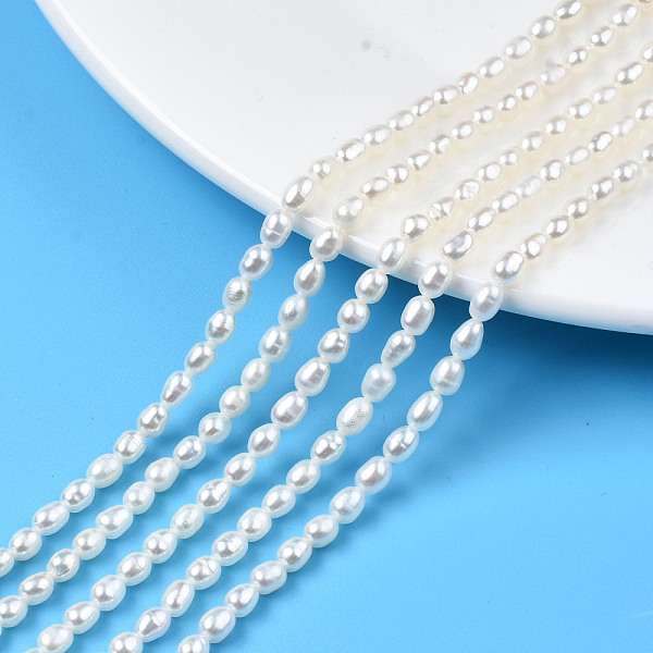 

PandaHall Natural Cultured Freshwater Pearl Beads Strands, Rice, Seashell Color, 4.5~5x3~4mm, Hole: 0.7mm, about 68~69pcs/strand, 14.17 inch...