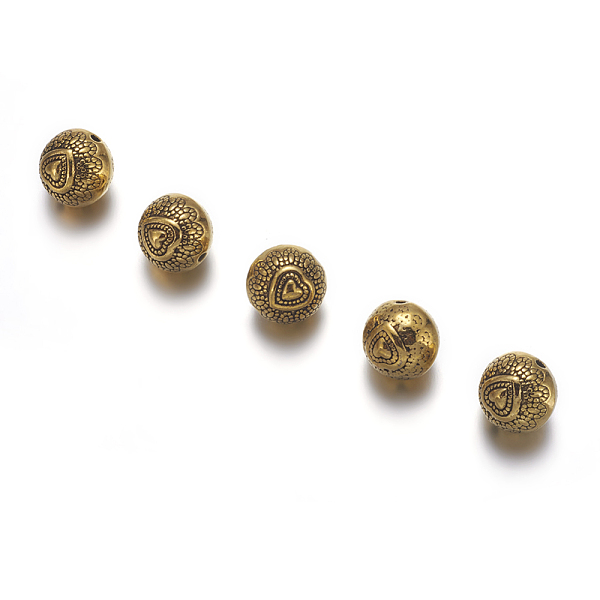 

PandaHall Tibetan Style Alloy Beads, Lead Free & Cadmium Free, Round with Heart, Antique Golden, about 10mm in diameter, 8mm thick, Hole...
