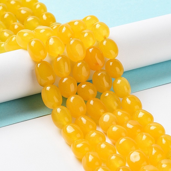 

PandaHall Natural White Jade Beads Strands, Dyed, Nuggets, Tumbled Stone, Gold, 9.5~11.5x8~8.5x7~8mm, Hole: 1mm, about 34~38pcs/strand...