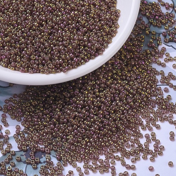

PandaHall MIYUKI Round Rocailles Beads, Japanese Seed Beads, 11/0, (RR301) Dark Topaz Rainbow Gold Luster, 2x1.3mm, Hole: 0.8mm, about..., Brown