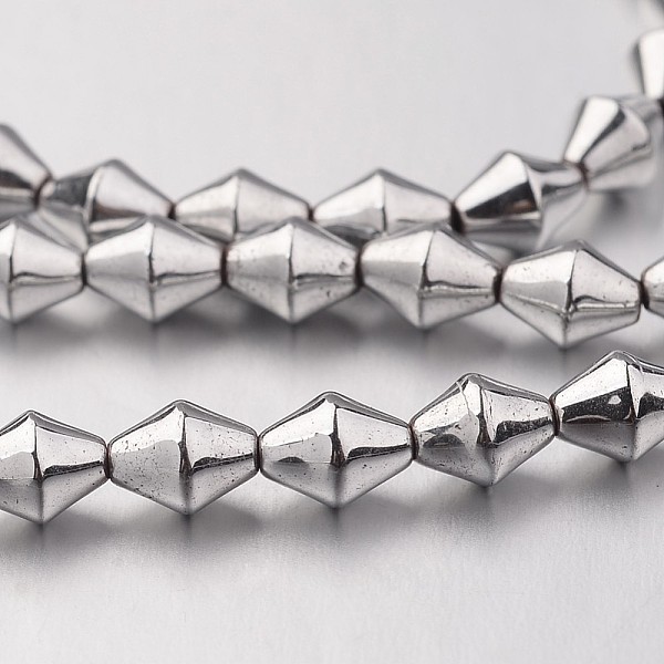 

PandaHall Electroplate Non-magnetic Synthetic Hematite Bead Strands, Bicone, Silver Plated, 5.5x4mm, Hole: 1mm, about 72pcs/strand, 15.7...