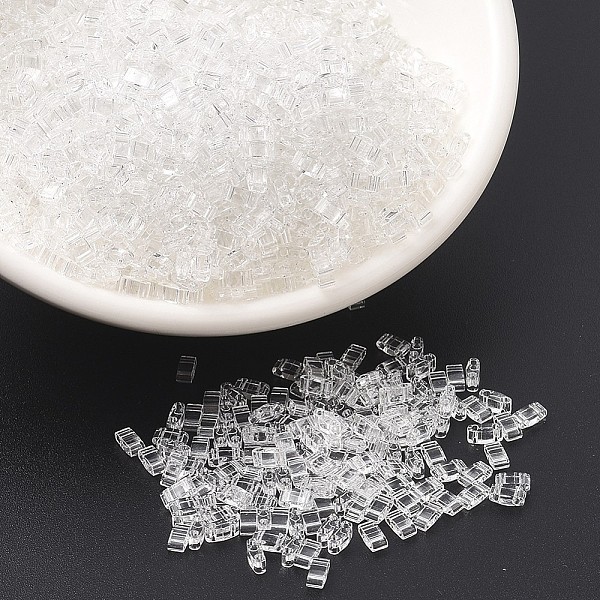 

PandaHall MIYUKI Half TILA Beads, Japanese Seed Beads, 2 Hole, (HTL131) Crystal, 5x2.3x1.9mm, Hole: 0.8mm, about 1250pcs/50g Glass Clear