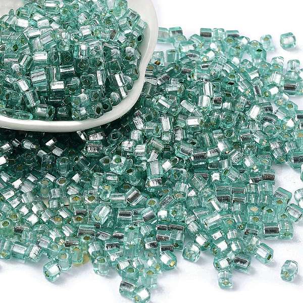 

PandaHall Glass Seed Beads, Silver Lined, Square, Cadet Blue, 3~4x3x3mm, Hole: 1.2mm, about 6300pcs/pound Glass